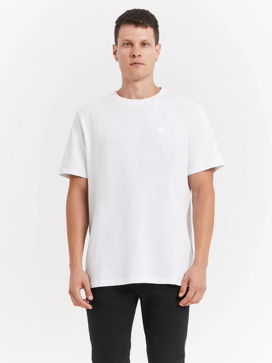 Image of a model wearing Tops. Productname: Neuw Neuw Premium T-Shirt in White colour by brand - Neuw