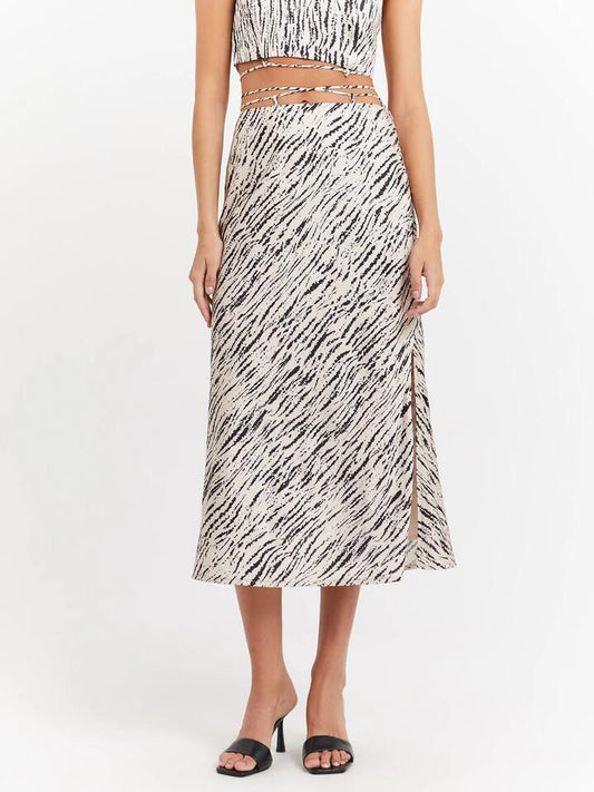 Image of a model wearing Skirts. Productname: First Mse Leya Satin Skirt in Animalia colour by brand - First Mse