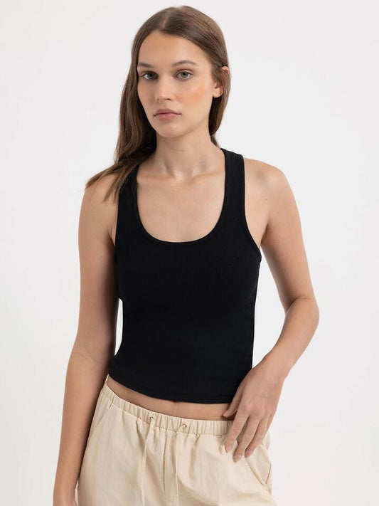 Image of a model wearing Tops. Productname: Beyond Her Milly Tank Top in Black colour by brand - Beyond Her