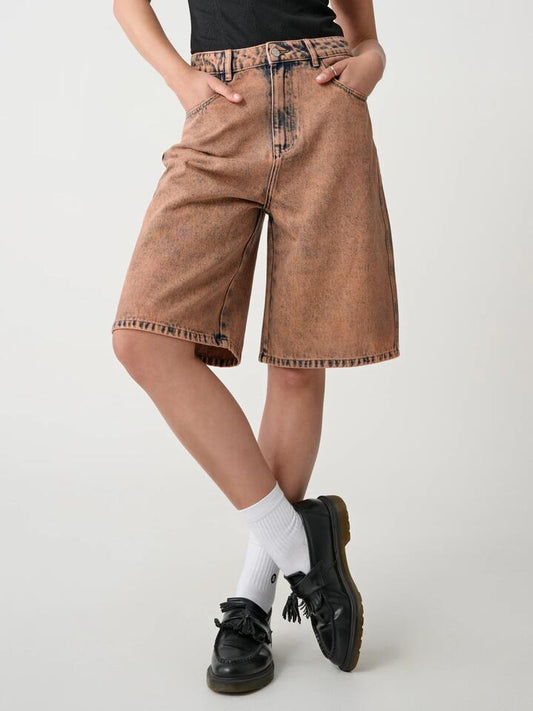Image of a model wearing Shorts. Productname: Xgirl Mills Baggy Short in Blush colour by brand - Xgirl