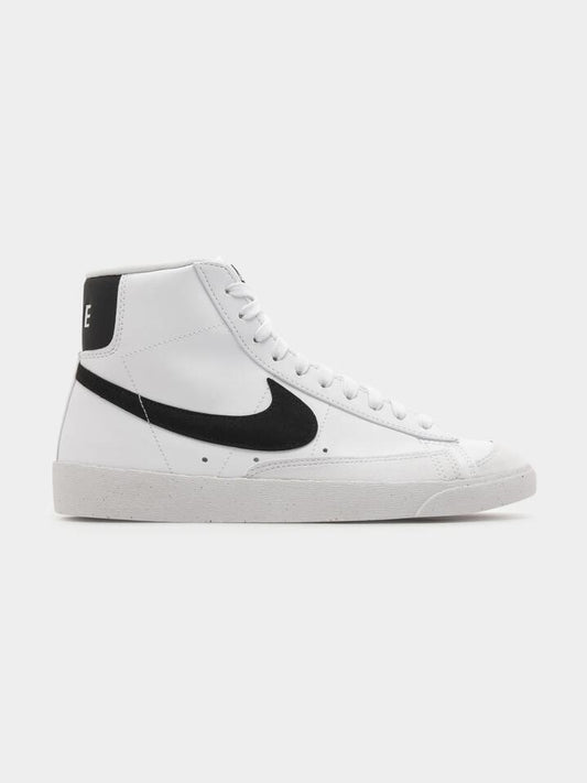 Image of a model wearing Outerwear. Productname: Nike Womens Blazer Mid '77 Next Nature in White/Black colour by brand - Nike