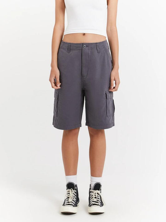 Image of a model wearing Shorts. Productname: Stussy Surplus Cargo Shorts in Charcoal colour by brand - Stussy