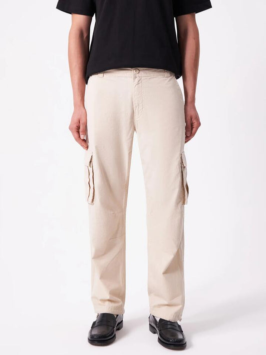 Image of a model wearing Pants. Productname: Article One Wyatt Cargo Pants in Ecru colour by brand - Article One