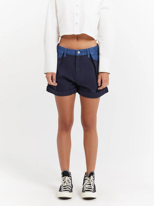 Image of a model wearing Shorts. Productname: Beyond Her Tari Pleated Shorts in Indigo-Blue colour by brand - Beyond Her