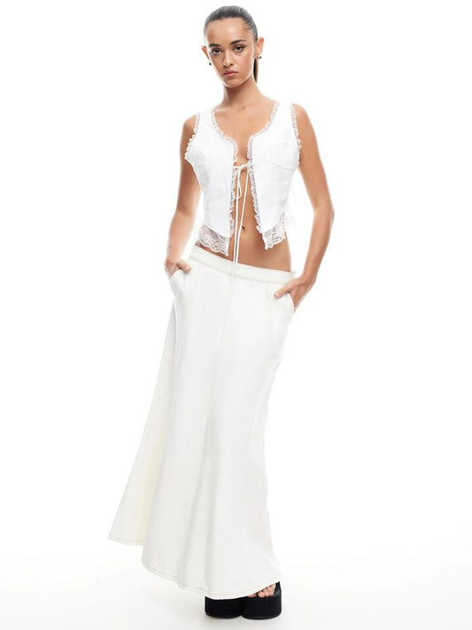 Image of a model wearing Denim. Productname: Lioness Wyoming Denim Skirt in Porcelain colour by brand - Lioness