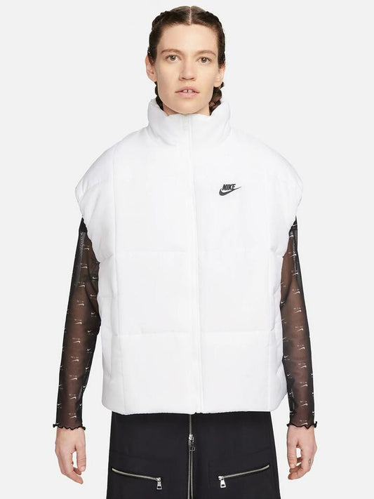 Image of a model wearing Tops. Productname: Nike Therma-FIT Loose Vest in White/Black colour by brand - Nike