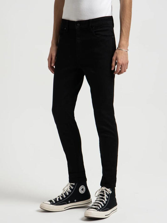 Image of a model wearing Denim. Productname: Wrangler Smith R28 Super Sonic Jeans in Denim colour by brand - Wrangler