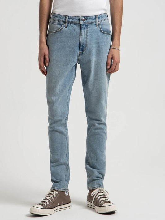 Image of a model wearing Denim. Productname: Wrangler Sid Slim Jeans in Light Blue colour by brand - Wrangler