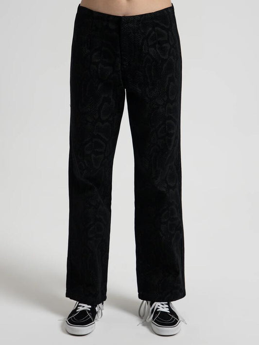 Image of a model wearing Pants. Productname: Worship Viper Hiatus Pants in Black colour by brand - Worship