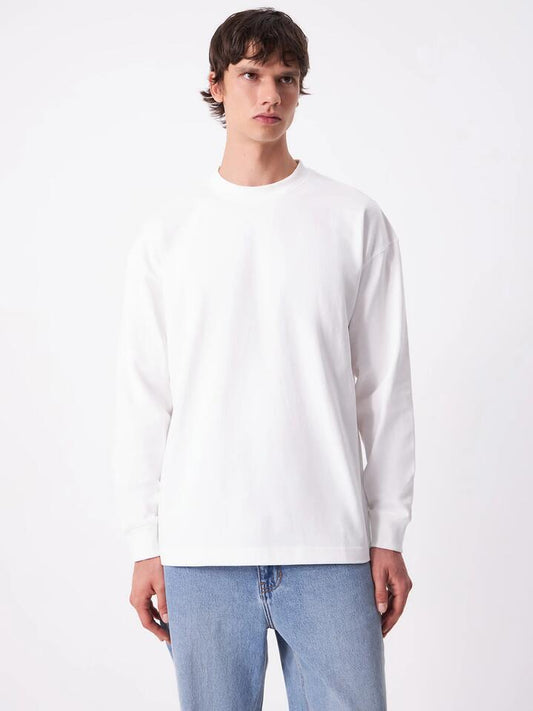 Image of a model wearing Tops. Productname: Article One Box Long Sleeve T-Shirt in White colour by brand - Article One