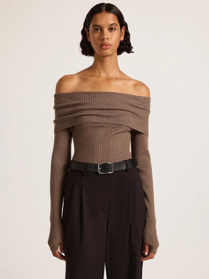 Image of a model wearing Tops. Productname: Nude Lucy Krishna Off Shoulder Knit in Mocha colour by brand - Nude Lucy