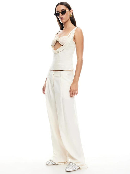 Image of a model wearing Pants. Productname: Lioness La Quinta Pants in Ivory colour by brand - Lioness