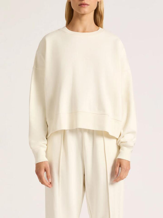 Image of a model wearing Outerwear. Productname: Nude Lucy Rhye Sweat in Ivory colour by brand - Nude Lucy