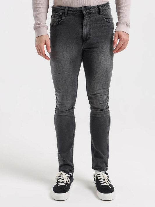 Image of a model wearing Denim. Productname: Article One Zane Skinny Denim Jeans in Washed Black colour by brand - Article One
