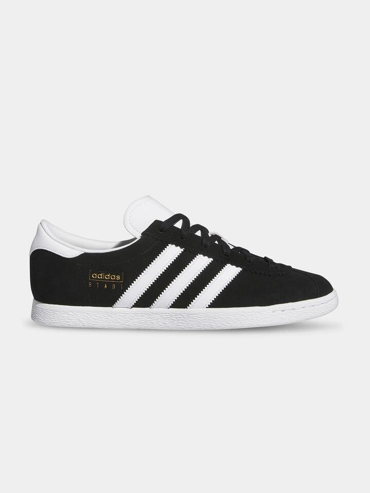 Image of Sneakers. Productname: Adidas Unisex Stadt Sneakers in Core Black/Cloud White/Gold colour by brand - Adidas