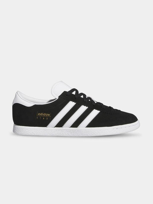 Image of Sneakers. Productname: Adidas Unisex Stadt Sneakers in Core Black/Cloud White/Gold colour by brand - Adidas