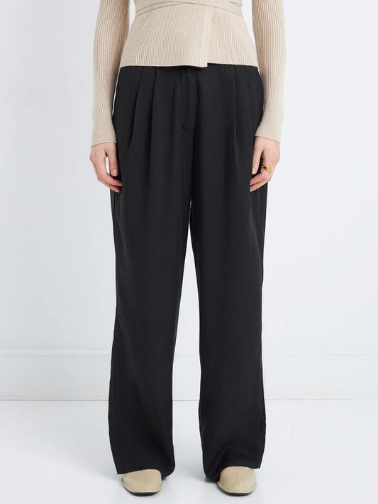 Image of a model wearing Pants. Productname: Lulu & Rose Mindy Pants in Black colour by brand - Lulu & Rose
