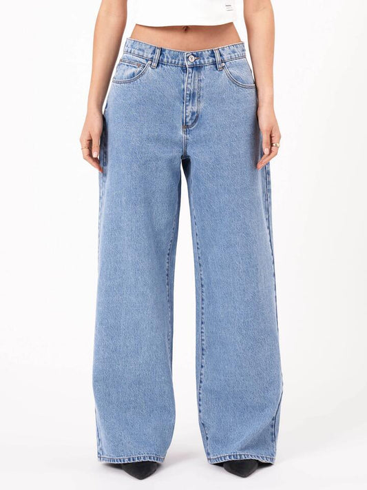 Image of a model wearing Denim. Productname: Abrand 95 Super Baggy Gigi in Mid Blue colour by brand - Abrand