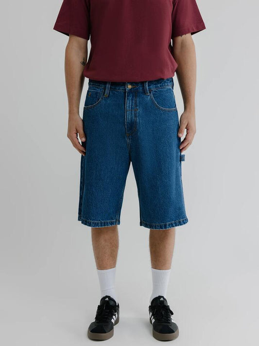 Image of a model wearing Shorts. Productname: Thrills Big Slacker Lifted Embro Shorts in Rinsed Blues colour by brand - Thrills