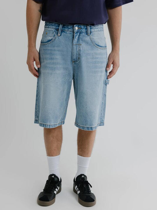 Image of a model wearing Shorts. Productname: Thrills Big Slacker Shadow Embro Shorts in Dust Blue colour by brand - Thrills