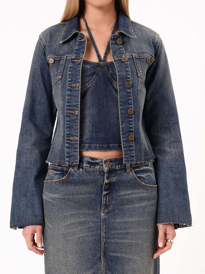 Image of a model wearing Outerwear. Productname: Abrand Zendaya 00 Denim Jacket in Dark Vintage Indigo colour by brand - Abrand
