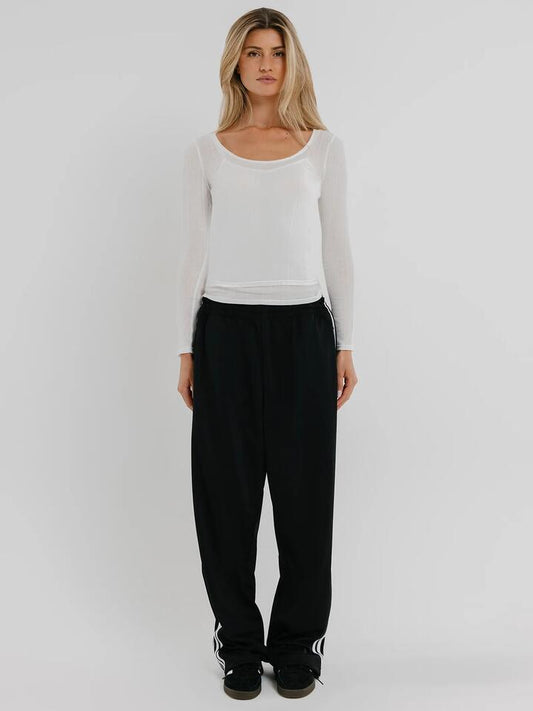Image of a model wearing Tops. Productname: Beyond Her Rhian Scoop 2 Ways Top in White colour by brand - Beyond Her