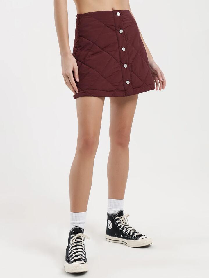 Image of a model wearing Skirts. Productname: Beyond Her Zara Quilted Skirt in Sangria colour by brand - Beyond Her