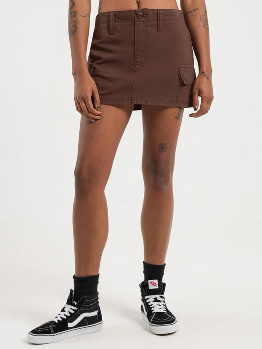 Image of a model wearing Skirts. Productname: Worship Rupture Mini Skirt in Rain Drum colour by brand - Worship