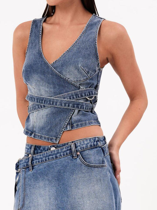 Image of a model wearing Tops. Productname: Abrand City Wrap Top Dalia in Mid Vintage Indigo colour by brand - Abrand