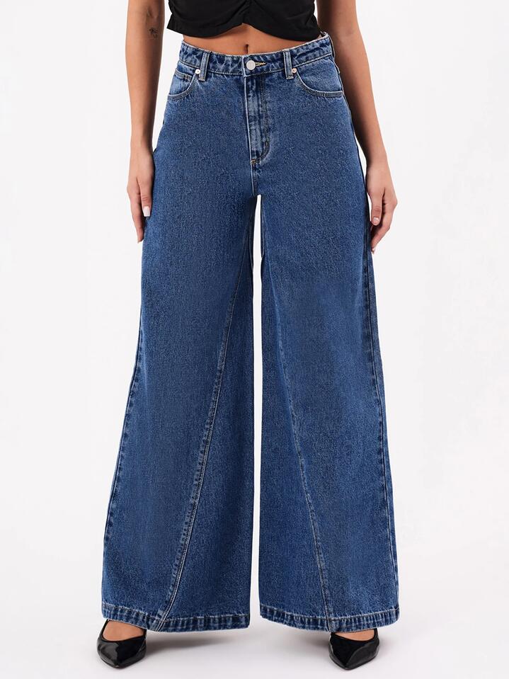 Image of a model wearing Denim. Productname: Abrand 94 Super Wide Chantell in Mid Vintage Blue colour by brand - Abrand