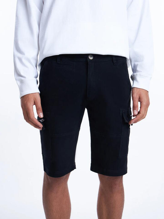 Image of a model wearing Shorts. Productname: Henleys Leon Short in Black colour by brand - Henleys