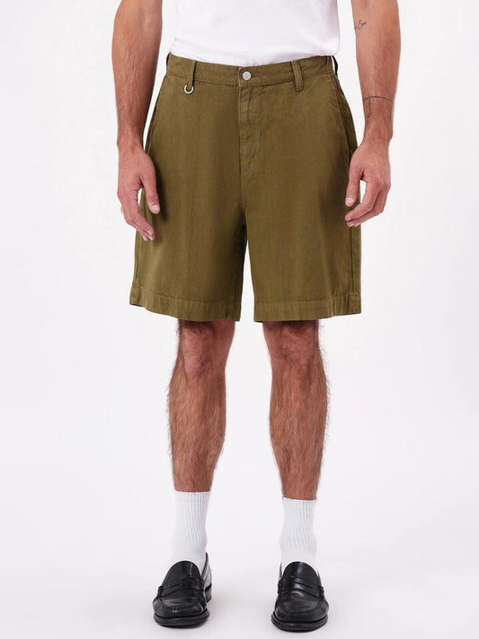 Image of a model wearing Shorts. Productname: Neuw River Relaxed Short in Bright Military colour by brand - Neuw