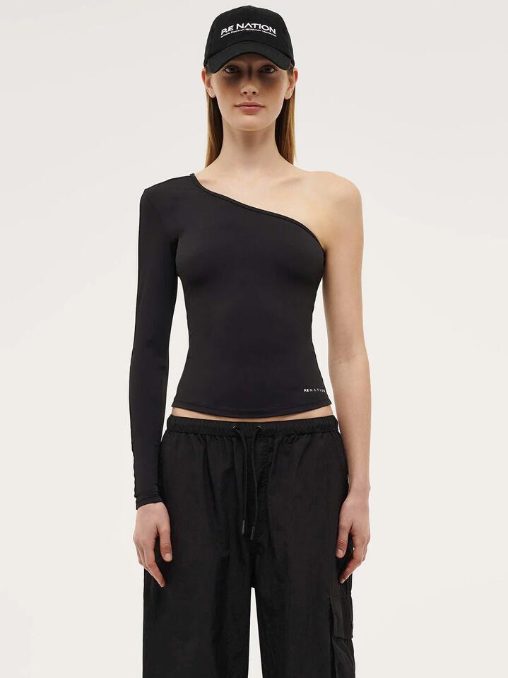 Image of a model wearing Tops. Productname: Pe Nation Foundation Asymmetric Long Sleeve Top in Black colour by brand - Pe Nation