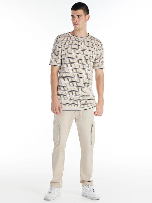 Image of a model wearing Tops. Productname: Nana Judy Claremont Knitted Tee in Bone Navy colour by brand - Nana Judy