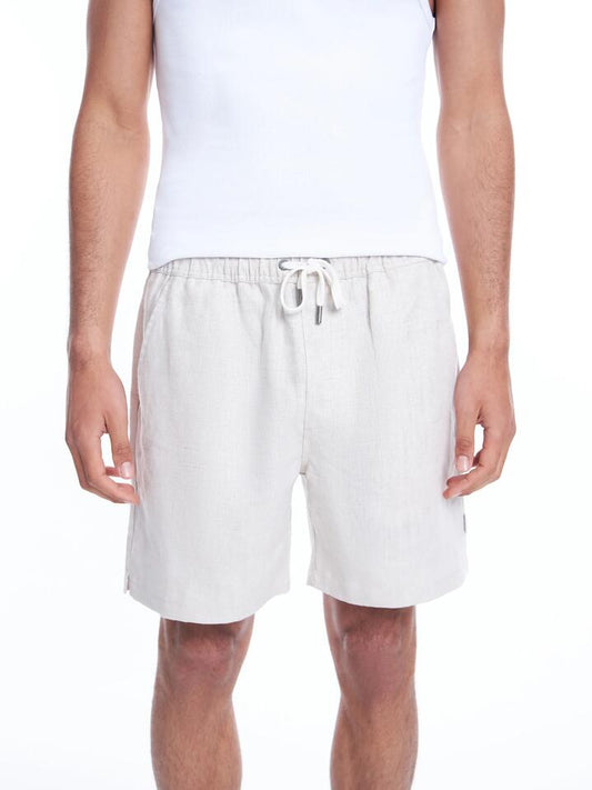 Image of a model wearing Shorts. Productname: Article One Luca Linen Shorts in Natural colour by brand - Article One