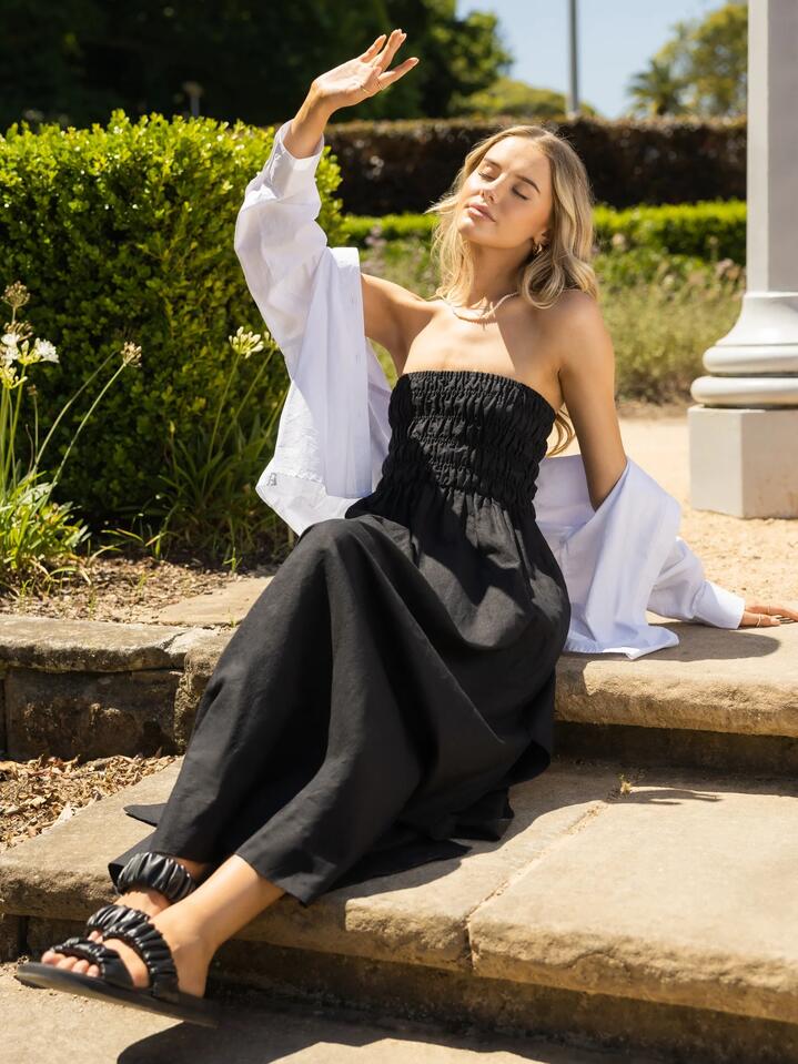Image of a model wearing Dress. Productname: Nude Lucy Zuri Maxi Dress in Black colour by brand - Nude Lucy