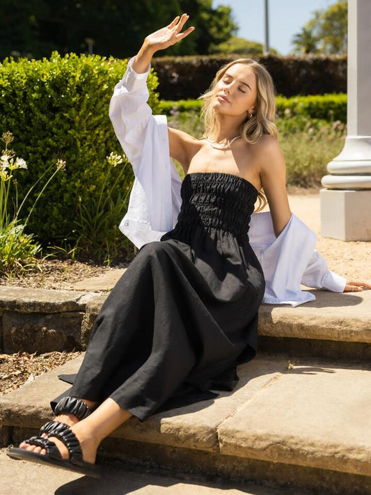 Image of a model wearing Dress. Productname: Nude Lucy Zuri Maxi Dress in Black colour by brand - Nude Lucy