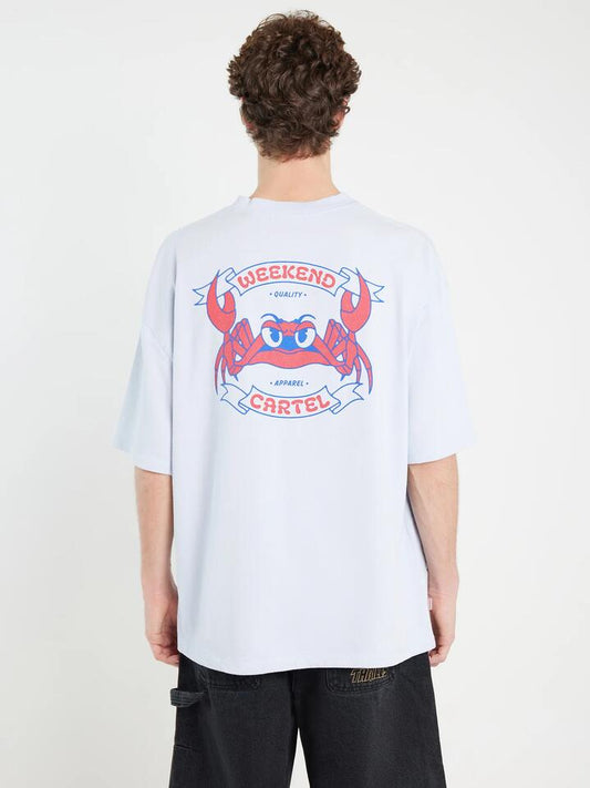 Image of a model wearing Tops. Productname: Weekend Cartel Crabbie Mate T-Shirt in Sky colour by brand - Weekend Cartel