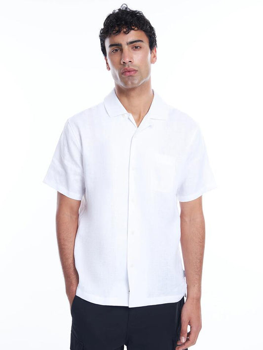 Image of a model wearing Tops. Productname: Article One Luca Linen Resort Shirt in White colour by brand - Article One