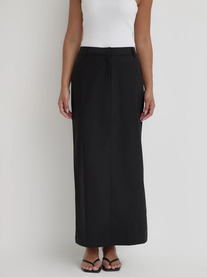 Image of a model wearing Skirts. Productname: 4th & Reckless Briella Skirt in Black colour by brand - 4th & Reckless