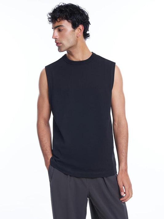 Image of a model wearing Tops. Productname: Article One Heavyweight Muscle in Black colour by brand - Article One
