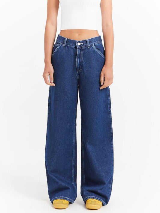 Image of a model wearing Pants. Productname: Carhartt Wip Jens Pants in Blue colour by brand - Carhartt Wip
