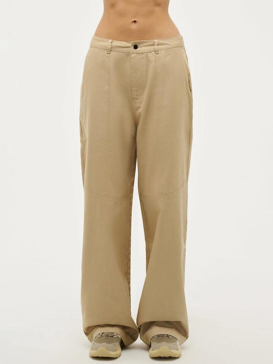 Image of a model wearing Pants. Productname: Pe Nation Headline Pant in Sesame colour by brand - Pe Nation