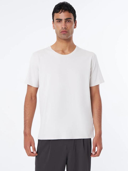 Image of a model wearing Tops. Productname: Article One Classic Tee in Ecru colour by brand - Article One