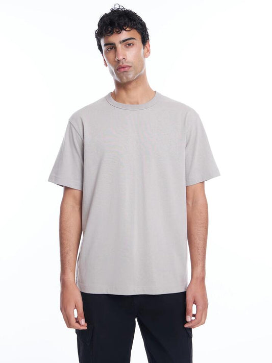 Image of a model wearing Tops. Productname: Article One Heavyweight Crew T-Shirt in Steel colour by brand - Article One