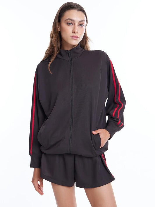 Image of a model wearing Outerwear. Productname: Beyond Her Reese Jacket in Choc/Red colour by brand - Beyond Her