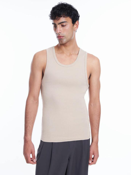 Image of a model wearing Tops. Productname: Article One Classic Singlet in Stone colour by brand - Article One