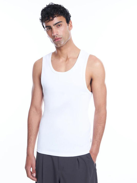 Image of a model wearing Tops. Productname: Article One Classic Singlet in White colour by brand - Article One