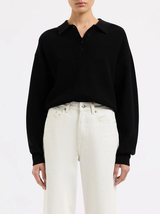 Image of a model wearing Tops. Productname: Nude Lucy Claud Rugby Knit in Black colour by brand - Nude Lucy