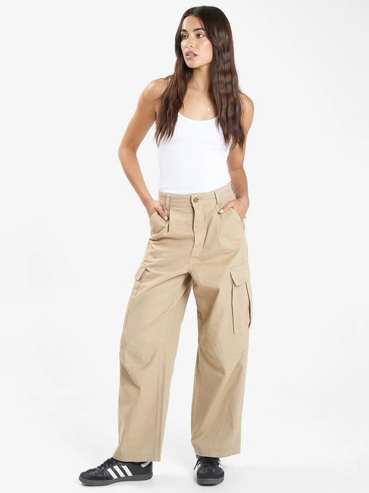 Image of a model wearing Pants. Productname: Thrills Union Slouch Pant in Sand colour by brand - Thrills